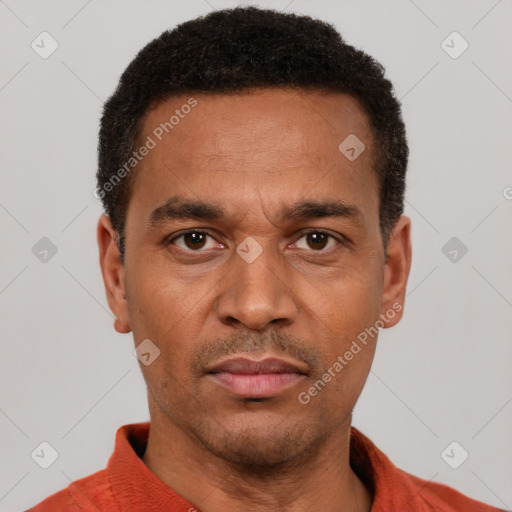 Neutral latino adult male with short  black hair and brown eyes