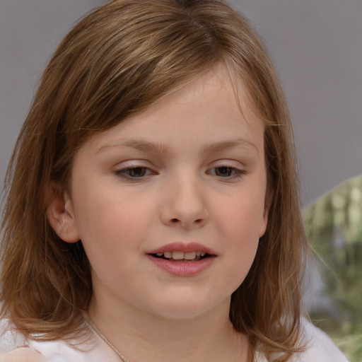 Joyful white child female with medium  brown hair and brown eyes