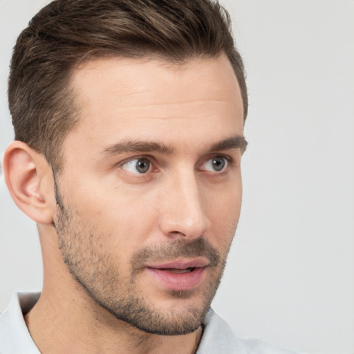 Neutral white young-adult male with short  brown hair and brown eyes