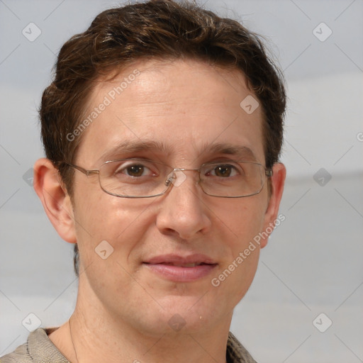 Joyful white adult male with short  brown hair and grey eyes