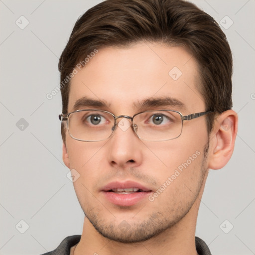 Neutral white young-adult male with short  brown hair and grey eyes