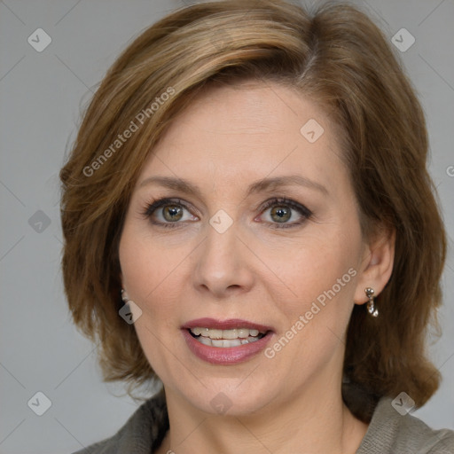 Joyful white adult female with medium  brown hair and brown eyes