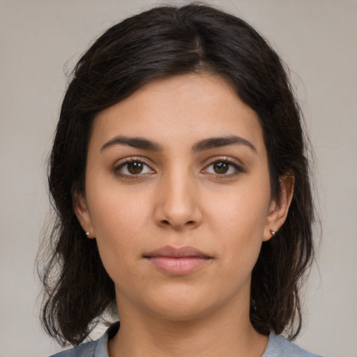 Neutral white young-adult female with medium  brown hair and brown eyes