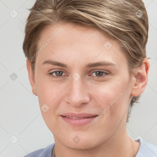 Joyful white young-adult female with short  brown hair and grey eyes