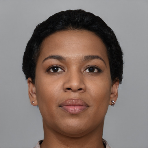 Joyful latino young-adult female with short  brown hair and brown eyes