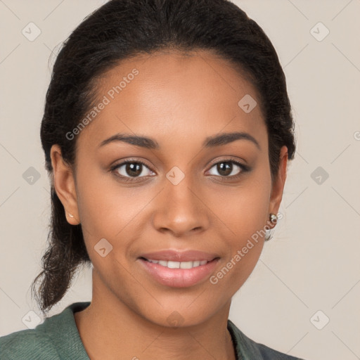 Joyful latino young-adult female with medium  brown hair and brown eyes