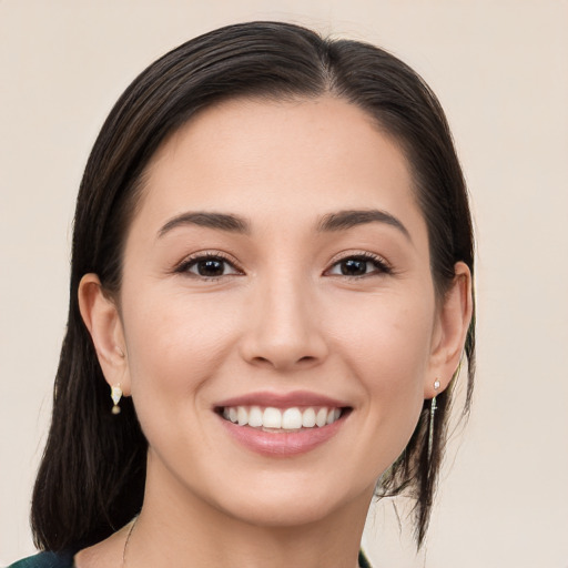 Joyful white young-adult female with medium  brown hair and brown eyes