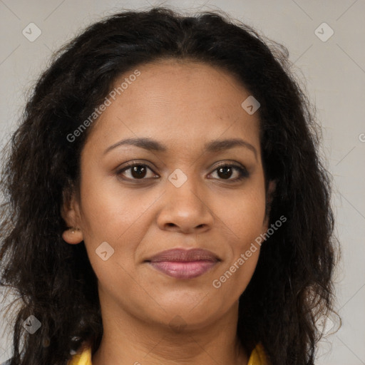 Joyful black young-adult female with long  brown hair and brown eyes
