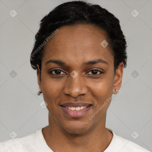 Joyful black young-adult female with short  black hair and brown eyes