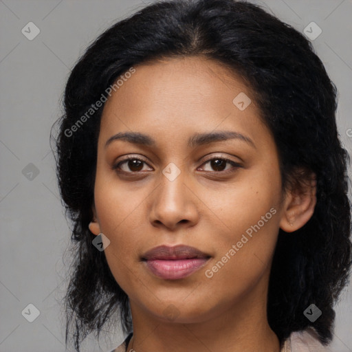 Joyful latino young-adult female with long  black hair and brown eyes