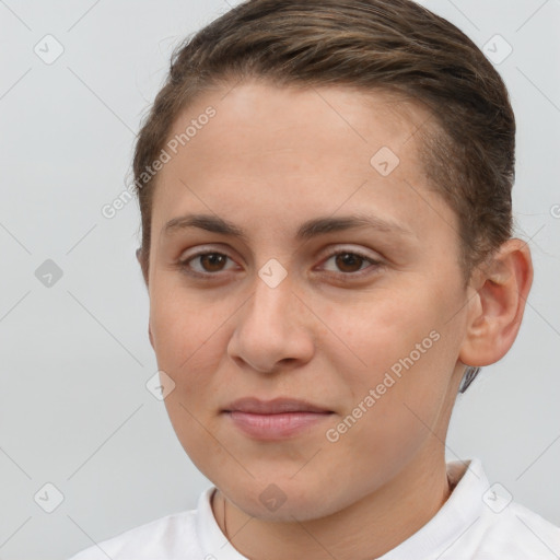 Joyful white young-adult female with short  brown hair and brown eyes