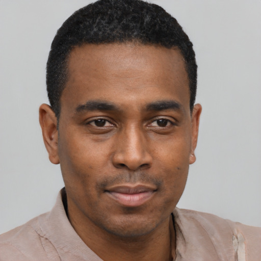 Neutral black young-adult male with short  black hair and brown eyes