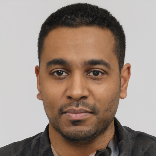 Neutral black young-adult male with short  black hair and brown eyes