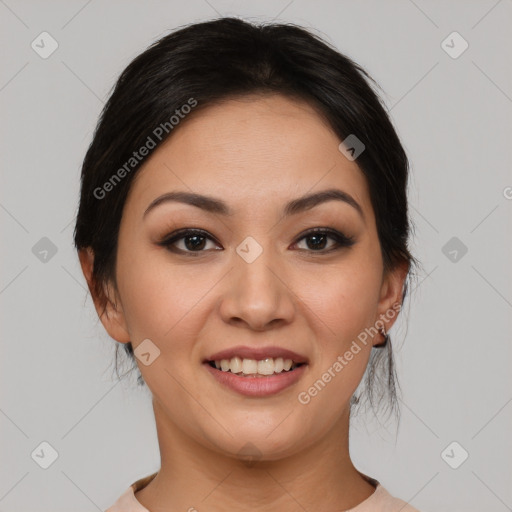 Joyful asian young-adult female with medium  black hair and brown eyes