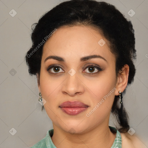 Joyful latino young-adult female with medium  brown hair and brown eyes