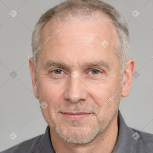 Neutral white middle-aged male with short  gray hair and brown eyes