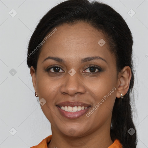 Joyful latino young-adult female with long  brown hair and brown eyes