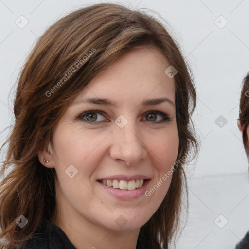 Joyful white young-adult female with long  brown hair and grey eyes