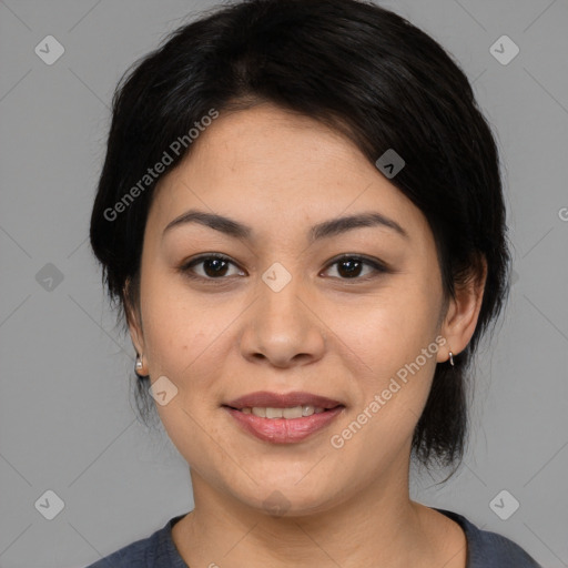 Joyful asian young-adult female with medium  black hair and brown eyes