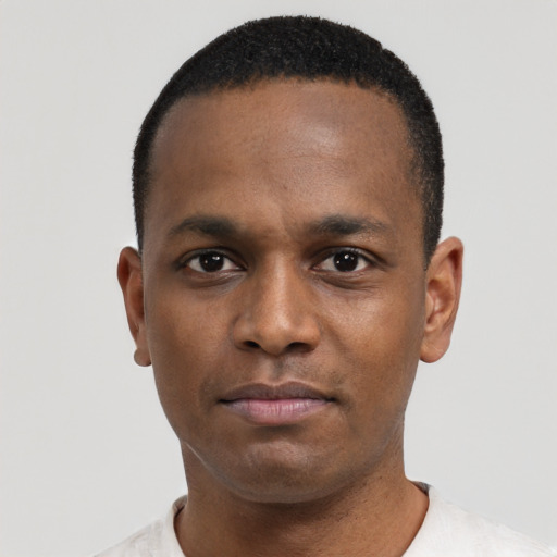 Neutral black young-adult male with short  black hair and brown eyes