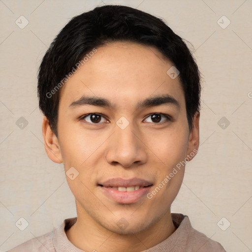 Joyful latino young-adult male with short  black hair and brown eyes