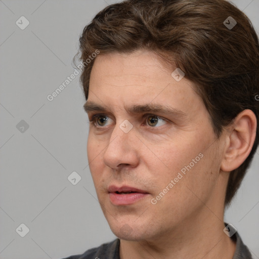 Neutral white adult male with short  brown hair and brown eyes