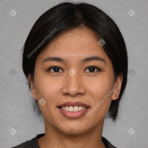 Joyful asian young-adult female with medium  black hair and brown eyes