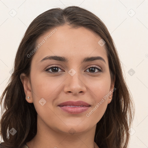 Joyful white young-adult female with long  brown hair and brown eyes