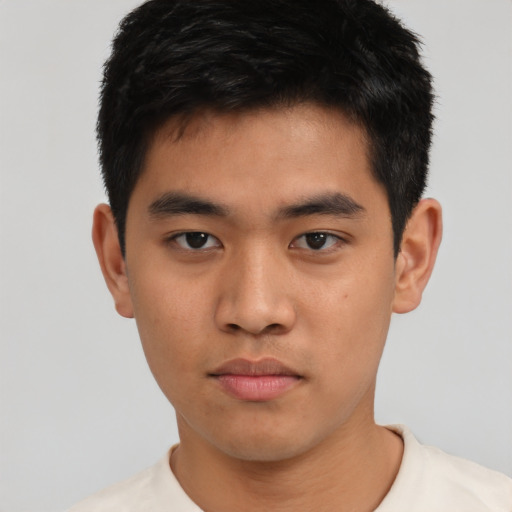 Neutral asian young-adult male with short  black hair and brown eyes