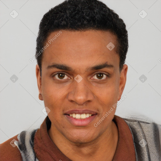 Joyful black young-adult male with short  black hair and brown eyes