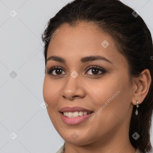 Joyful white young-adult female with long  brown hair and brown eyes