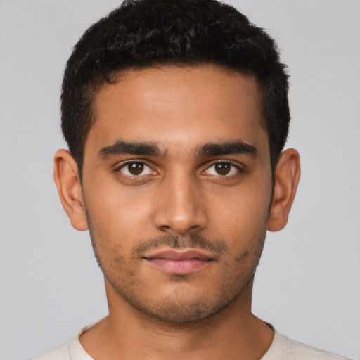 Neutral latino young-adult male with short  brown hair and brown eyes