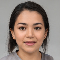 Joyful asian young-adult female with medium  brown hair and brown eyes