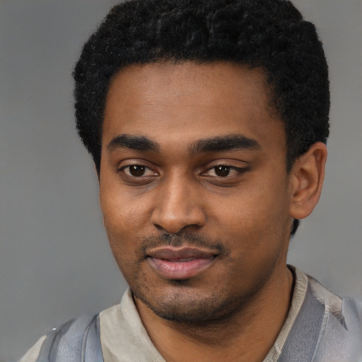 Neutral black young-adult male with short  black hair and brown eyes