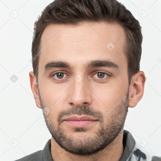 Neutral white young-adult male with short  brown hair and brown eyes