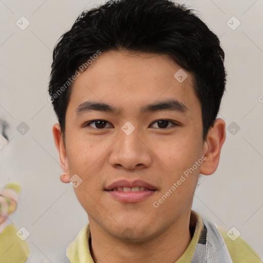 Joyful asian young-adult male with short  black hair and brown eyes