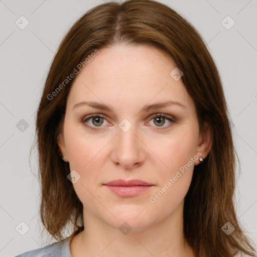 Joyful white young-adult female with medium  brown hair and green eyes