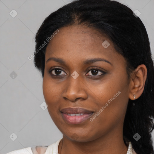 Joyful black young-adult female with medium  black hair and brown eyes