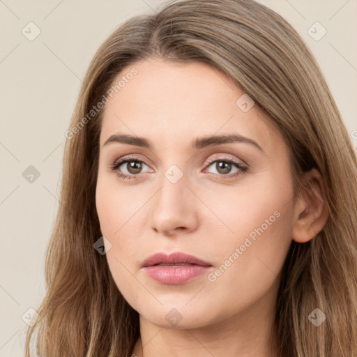 Neutral white young-adult female with long  brown hair and brown eyes