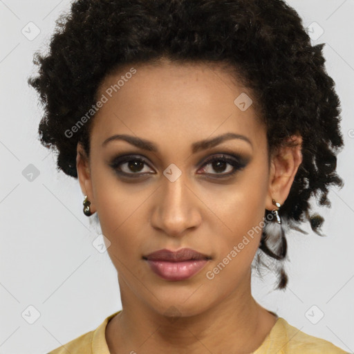 Joyful black young-adult female with short  brown hair and brown eyes