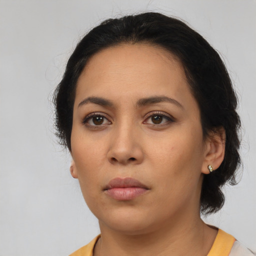 Neutral asian young-adult female with medium  black hair and brown eyes