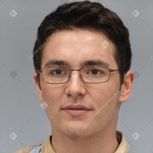 Joyful white adult male with short  brown hair and brown eyes