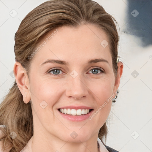 Joyful white young-adult female with medium  brown hair and blue eyes