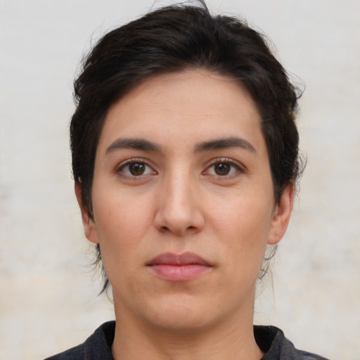 Neutral white young-adult female with short  brown hair and brown eyes