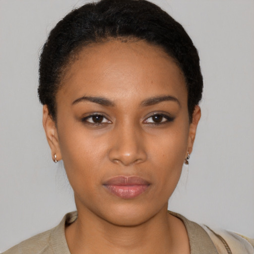 Neutral black young-adult female with short  black hair and brown eyes