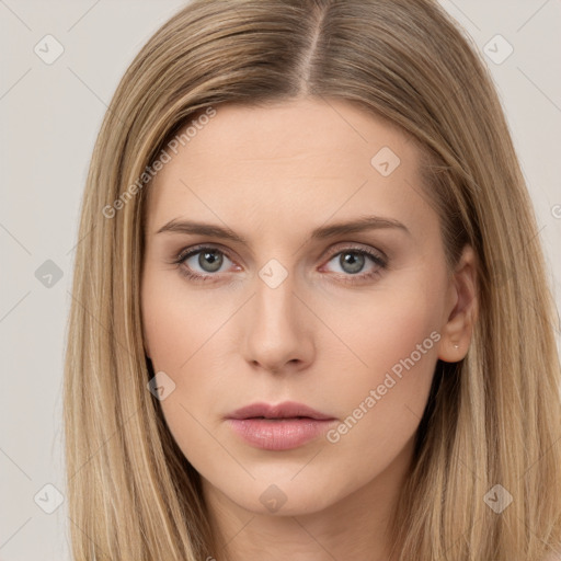 Neutral white young-adult female with long  brown hair and brown eyes