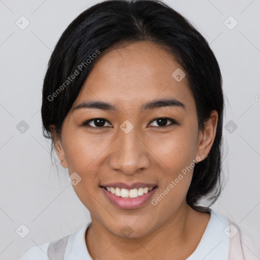 Joyful asian young-adult female with medium  black hair and brown eyes