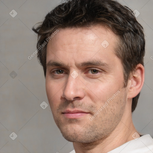 Neutral white adult male with short  brown hair and brown eyes