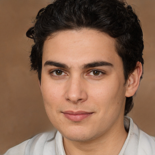 Joyful white young-adult male with medium  brown hair and brown eyes