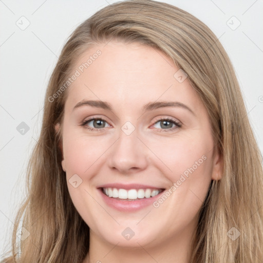 Joyful white young-adult female with long  brown hair and grey eyes